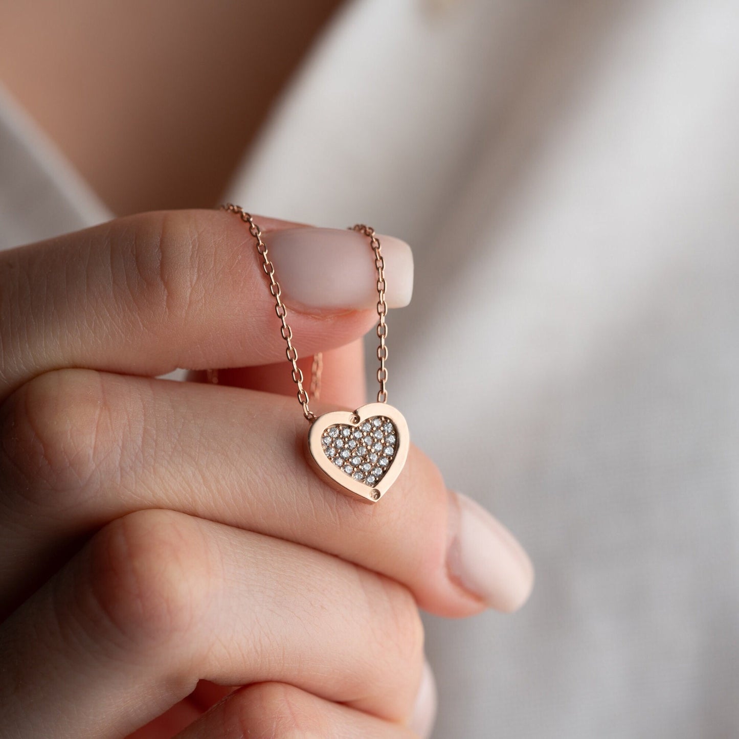 Elegant heart-shaped necklace crafted from 925 sterling silver, adorned with a central zircon stone, presented in a gift box