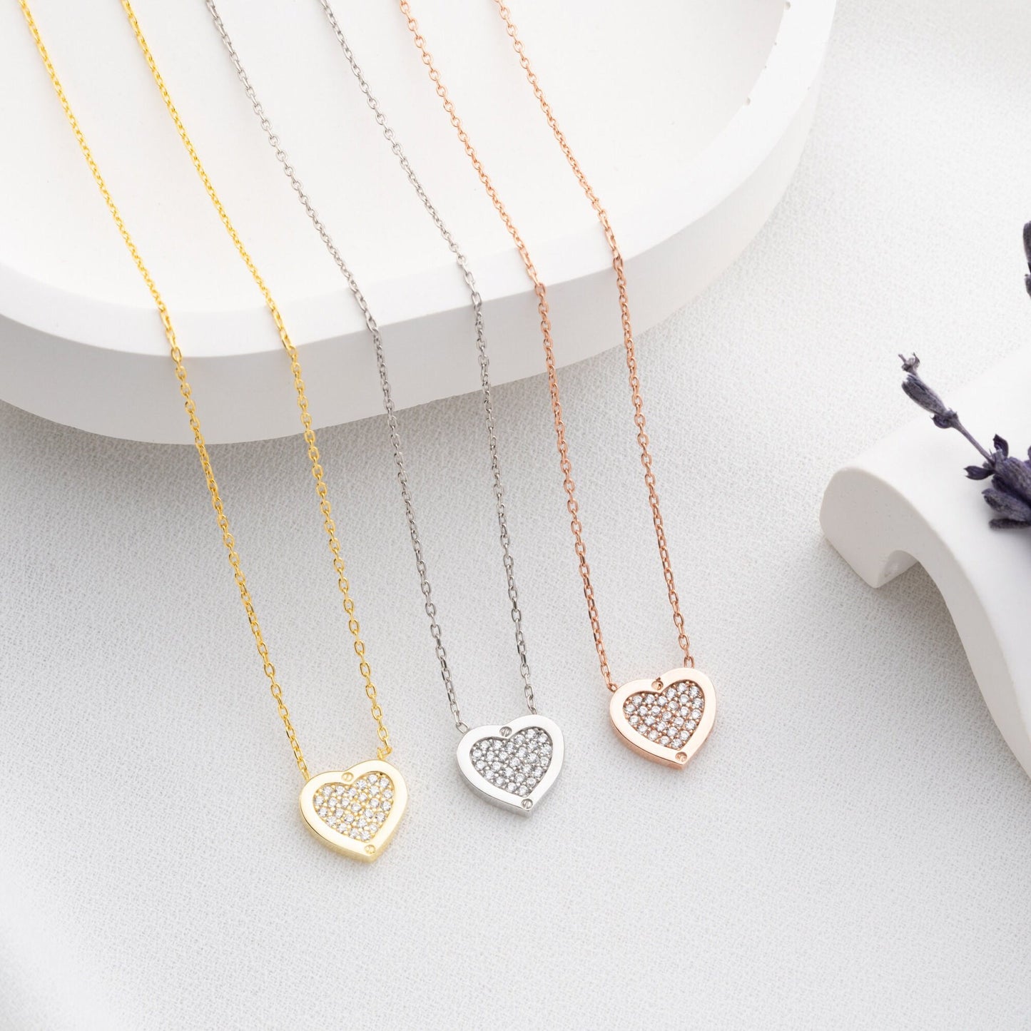 Elegant heart-shaped necklace crafted from 925 sterling silver, adorned with a central zircon stone, presented in a gift box