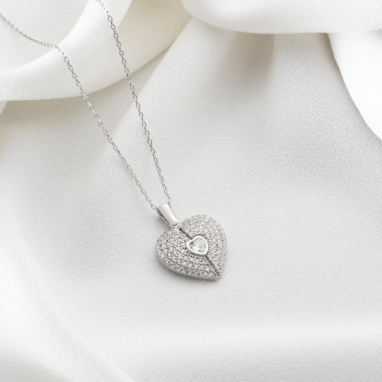 Personalized heart necklace with angel wings and name engraving, available in 925 sterling silver, 14k gold, and rose gold plated options. A meaningful, handmade jewelry gift for loved ones.