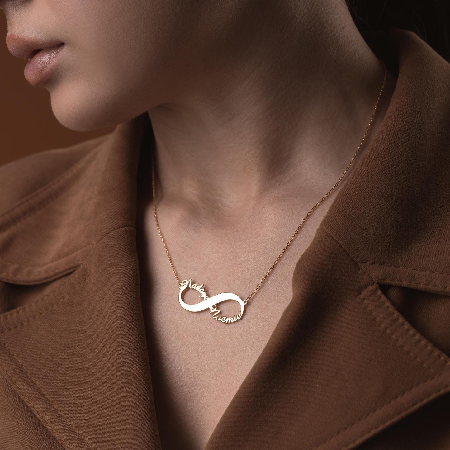 Custom infinity necklace with two personalized names, crafted in 925 sterling silver and 14k gold plated options. A timeless symbol of eternal love and unity.