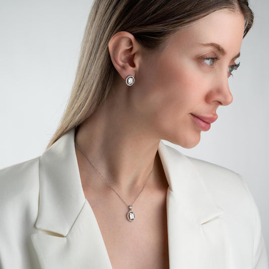 Oval elegance jewelry set with pendant necklace and earrings, featuring cubic zirconia stones, available in 925 sterling silver and 14K gold-plated options.