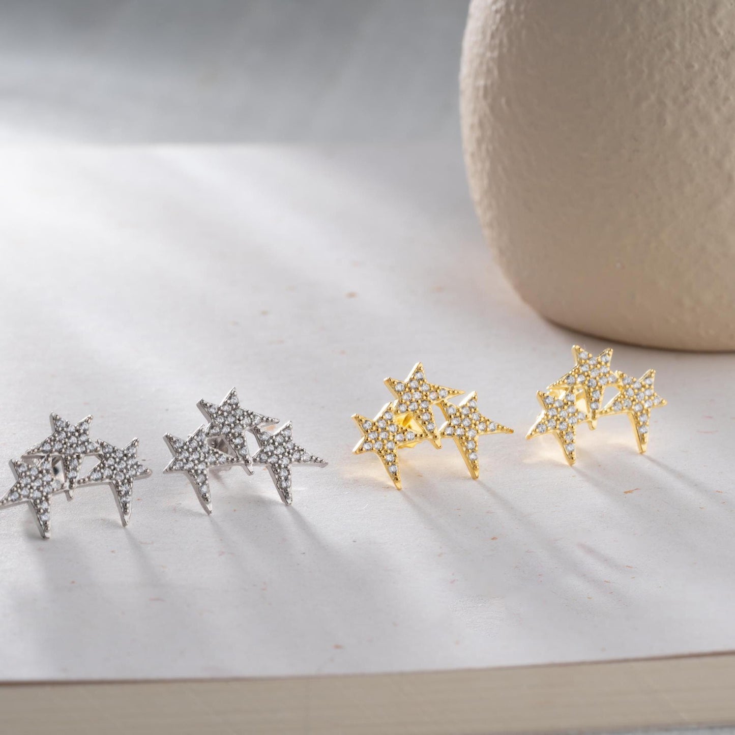 Star cluster earrings in 925 Sterling Silver and 14K Gold Plated options, adorned with cubic zirconia stones for an elegant holiday look.