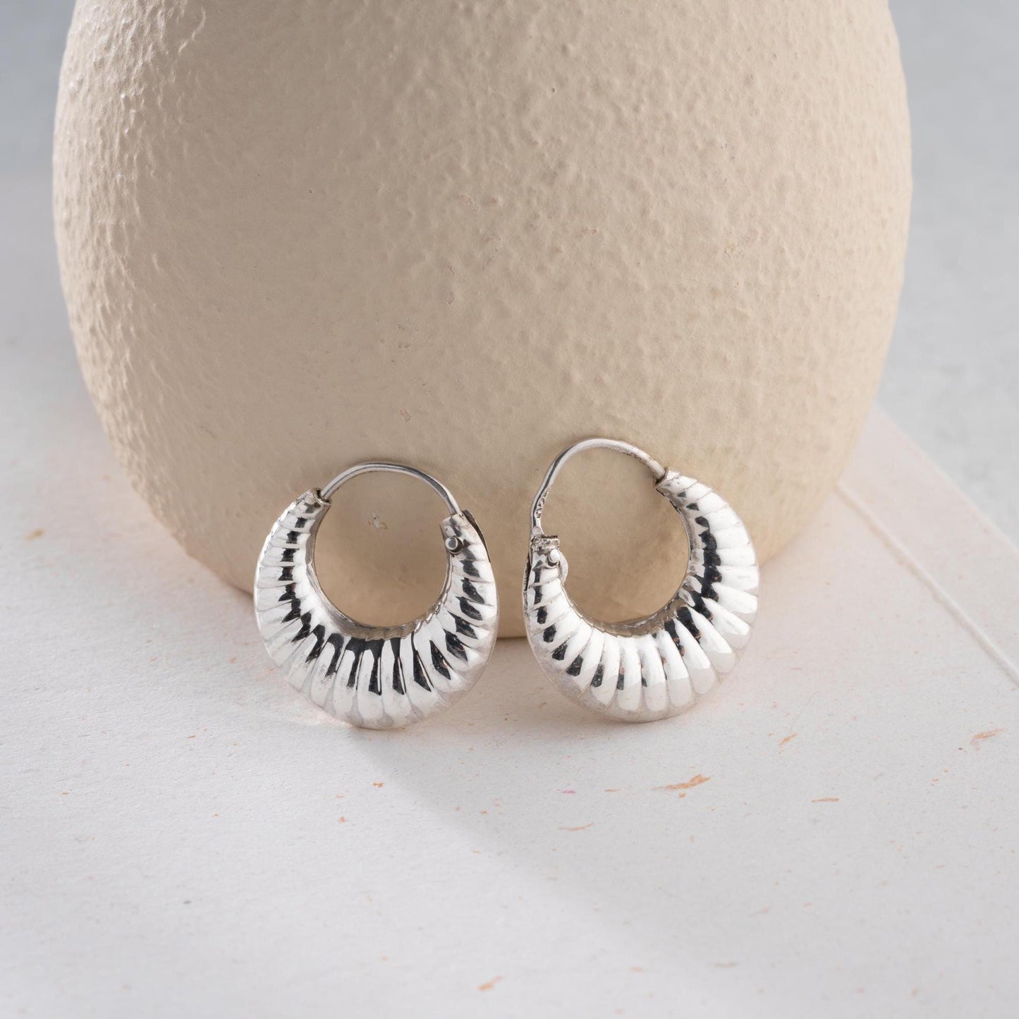 Crescent-shaped hoop earrings crafted from 925 sterling silver with 14K gold-plated options, featuring a textured design, perfect for Christmas gifts.
