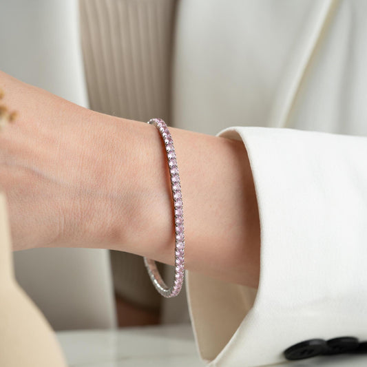 Vibrant stackable tennis bracelet set featuring multicolored cubic zirconia stones, crafted in 925 Sterling Silver with a 14K Gold Plated option, perfect for festive and everyday wear.