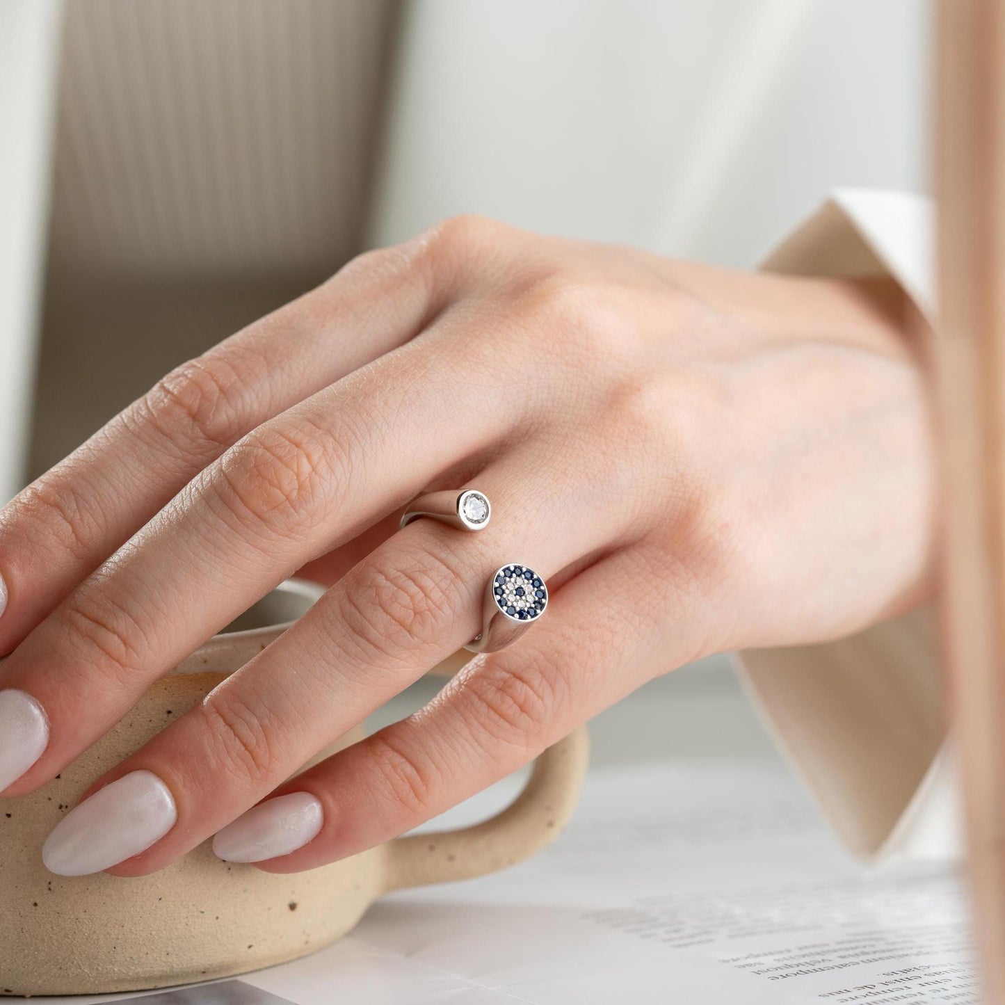 Adjustable open ring featuring a round evil eye charm with cubic zirconia stones, crafted in 925 Sterling Silver and 14K Gold Plated finish.