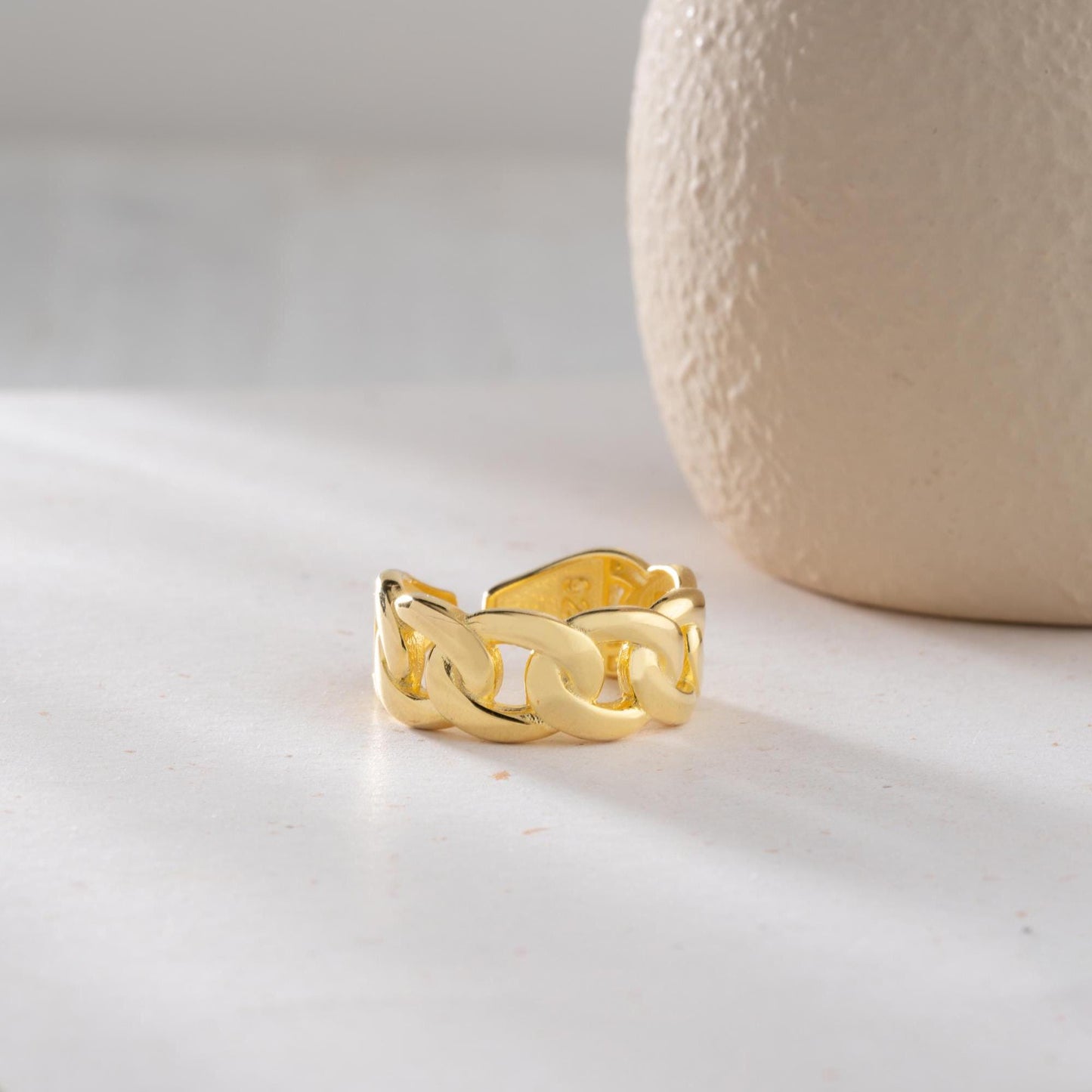 Chunky chain link open ring crafted from 925 sterling silver, available in gold plated and silver finishes. Adjustable design for a perfect fit.