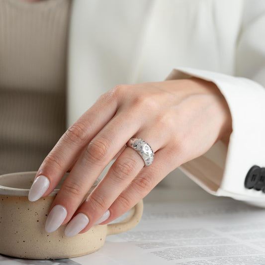 Elegant pave dome ring featuring dazzling cubic zirconia stones, crafted in 925 sterling silver with 14K gold plated options. A luxurious, adjustable statement ring for women.