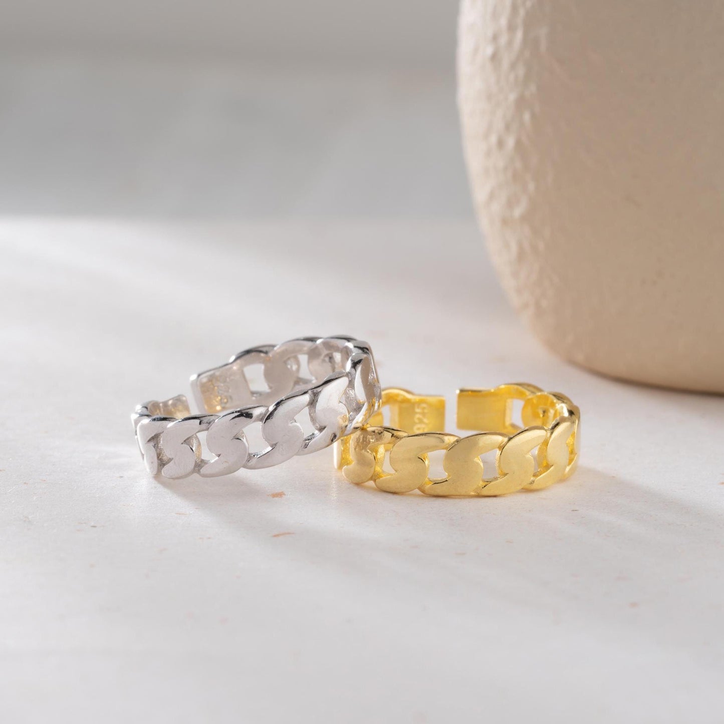 Chunky chain link ring crafted from 925 sterling silver with 14K gold plating, featuring an adjustable open band. Stylish unisex jewelry perfect for bold statement looks.