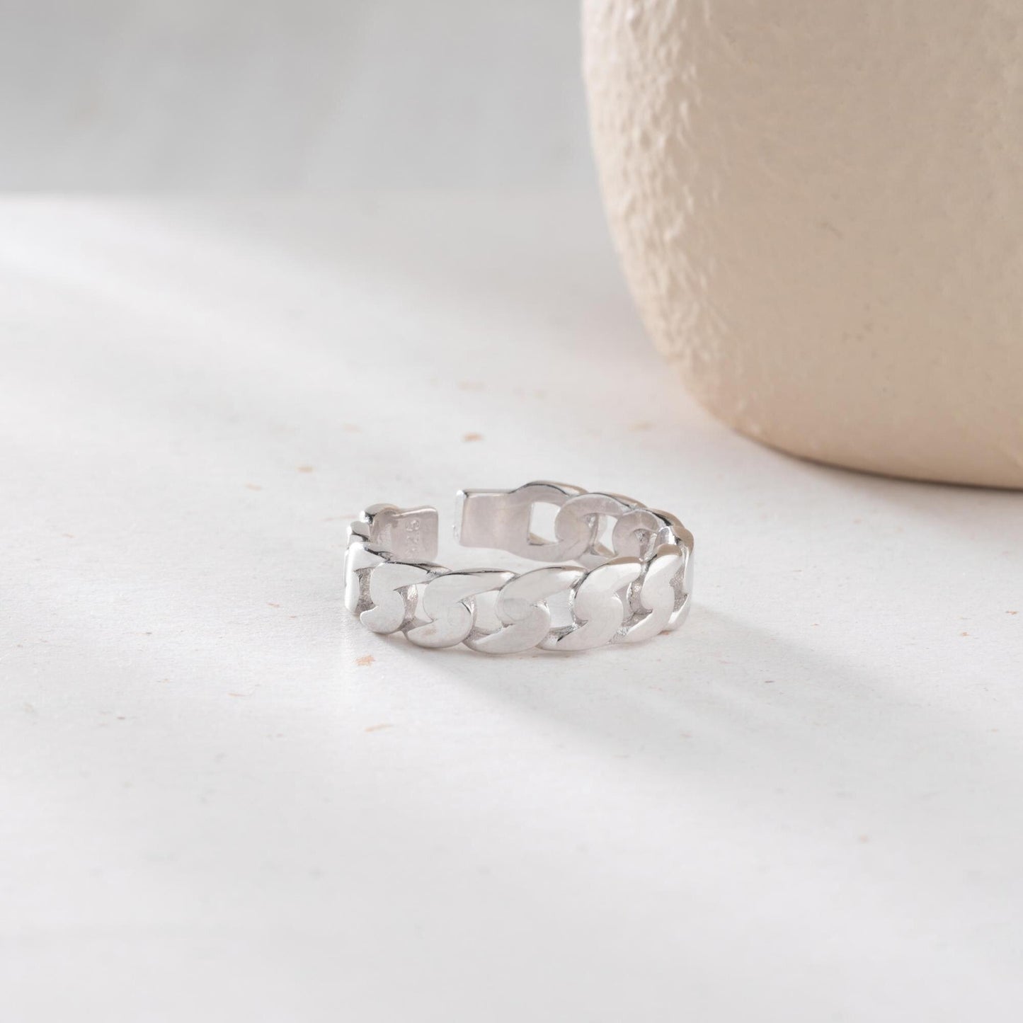 Chunky chain link ring crafted from 925 sterling silver with 14K gold plating, featuring an adjustable open band. Stylish unisex jewelry perfect for bold statement looks.