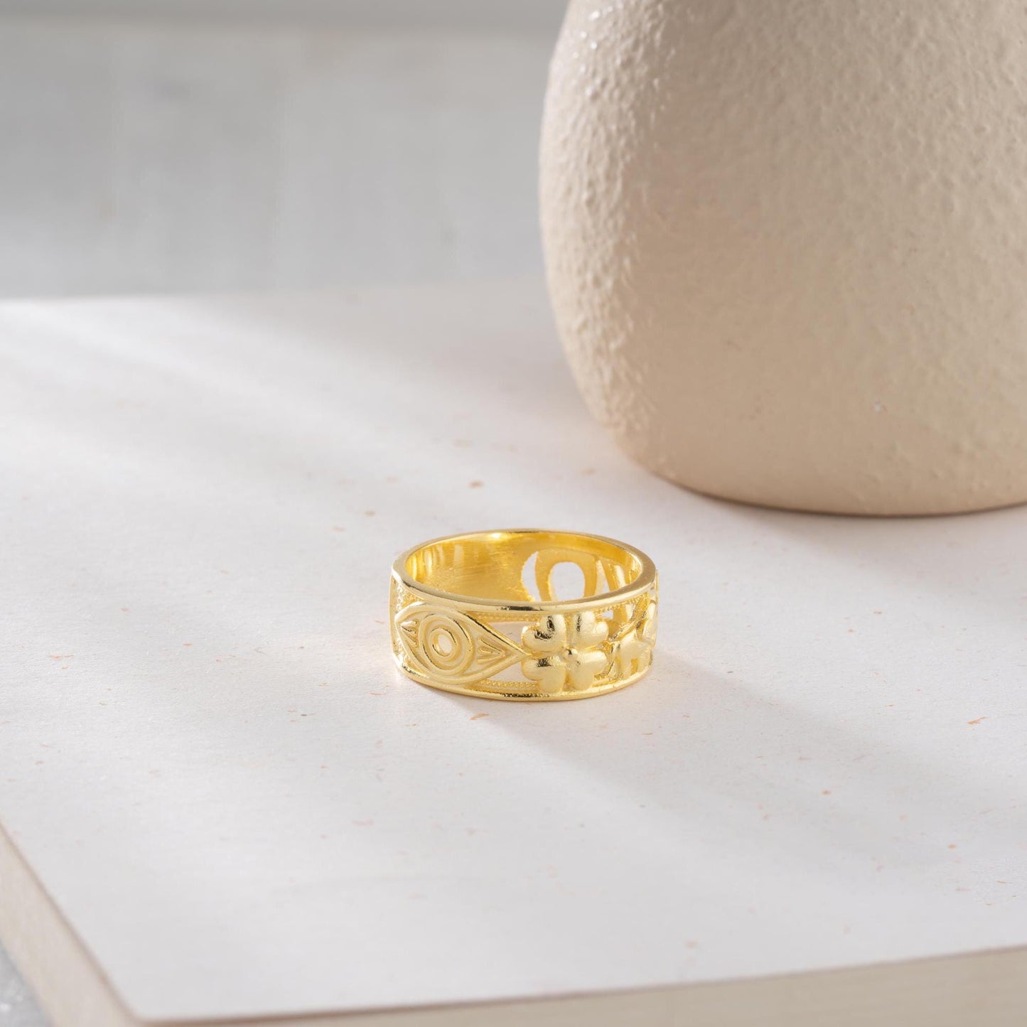 Floral wide band ring with intricate openwork flower design, available in 925 sterling silver and 14K gold plating. Elegant nature-inspired jewelry perfect for gifting.