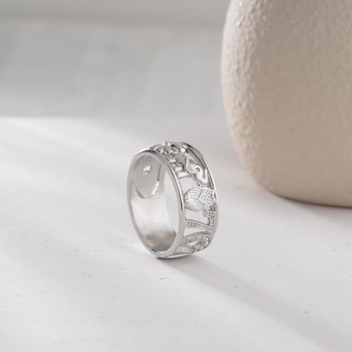 Floral wide band ring with intricate openwork flower design, available in 925 sterling silver and 14K gold plating. Elegant nature-inspired jewelry perfect for gifting.