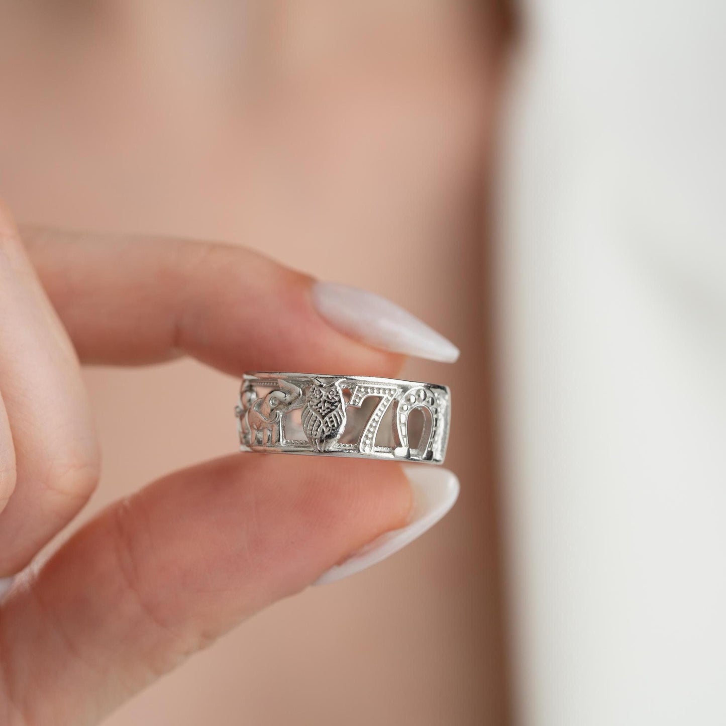 Floral wide band ring with intricate openwork flower design, available in 925 sterling silver and 14K gold plating. Elegant nature-inspired jewelry perfect for gifting.