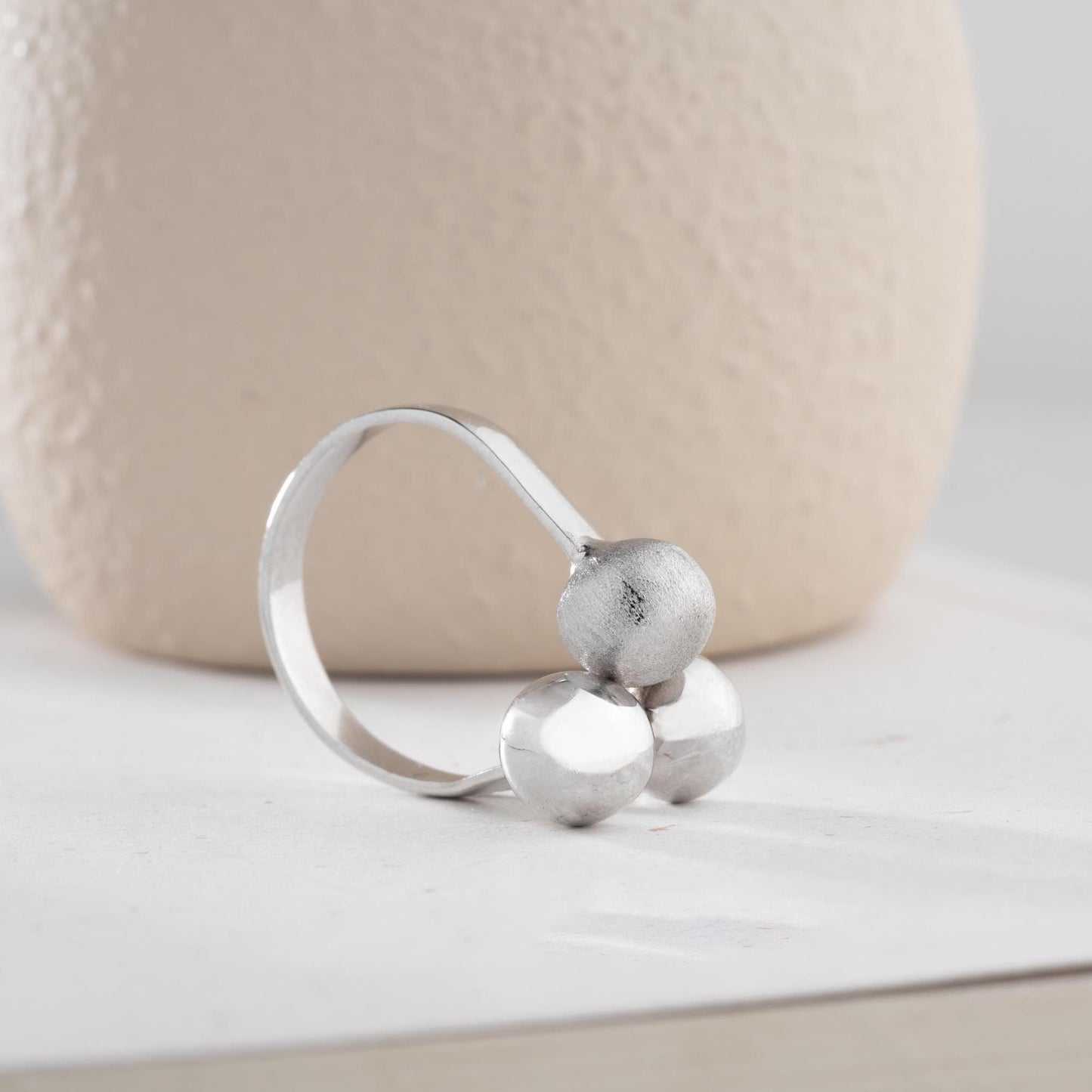 Triple ball adjustable open ring in 925 sterling silver and 14K gold plating, featuring a mix of shiny, matte, and brushed textures.