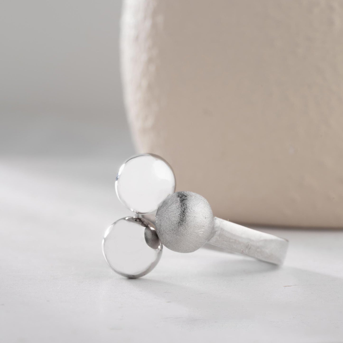 Triple ball adjustable open ring in 925 sterling silver and 14K gold plating, featuring a mix of shiny, matte, and brushed textures.