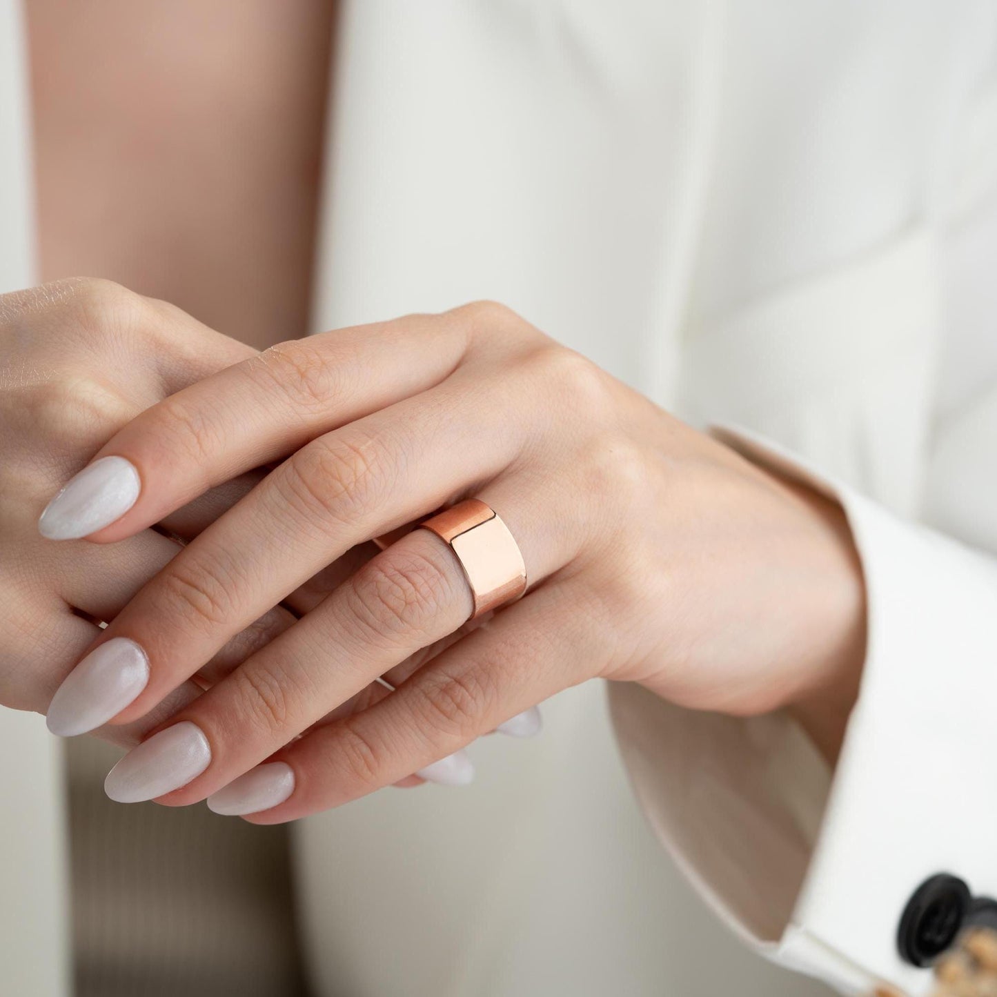 A bold, wide band open ring crafted from 925 Sterling Silver, available in gold and rose gold finishes. Adjustable design for comfort and style, ideal for gifting.