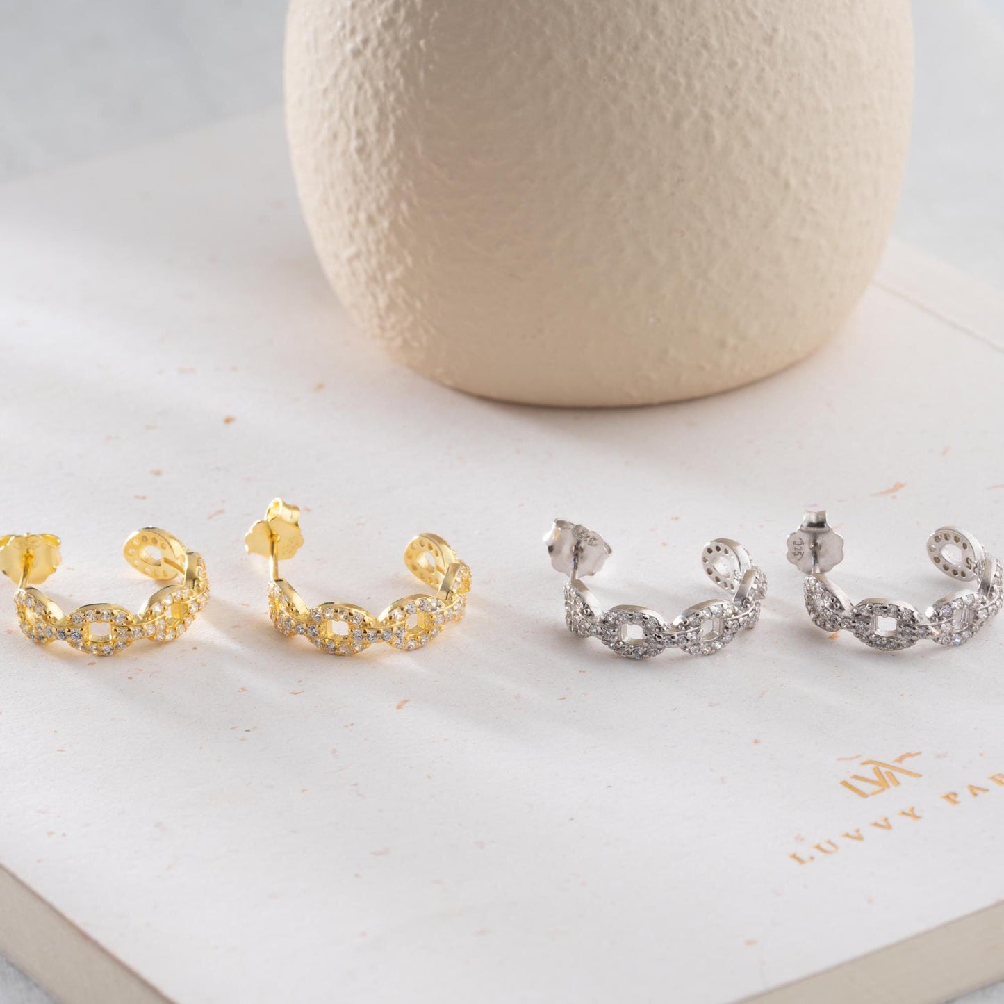 Chain link hoop earrings in 925 sterling silver with 14K gold plated option, adorned with sparkling cubic zirconia stones, ideal for gifting.