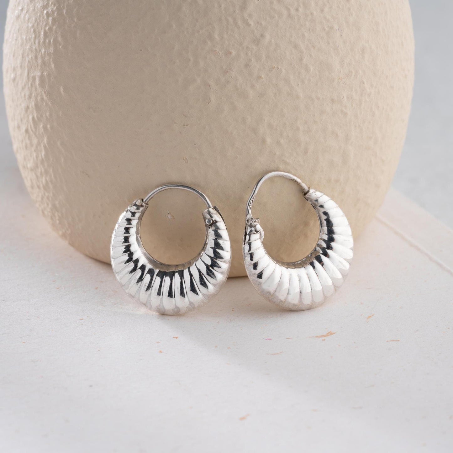 Crescent-shaped hoop earrings crafted from 925 sterling silver with 14K gold-plated options, featuring a textured design, perfect for Christmas gifts.