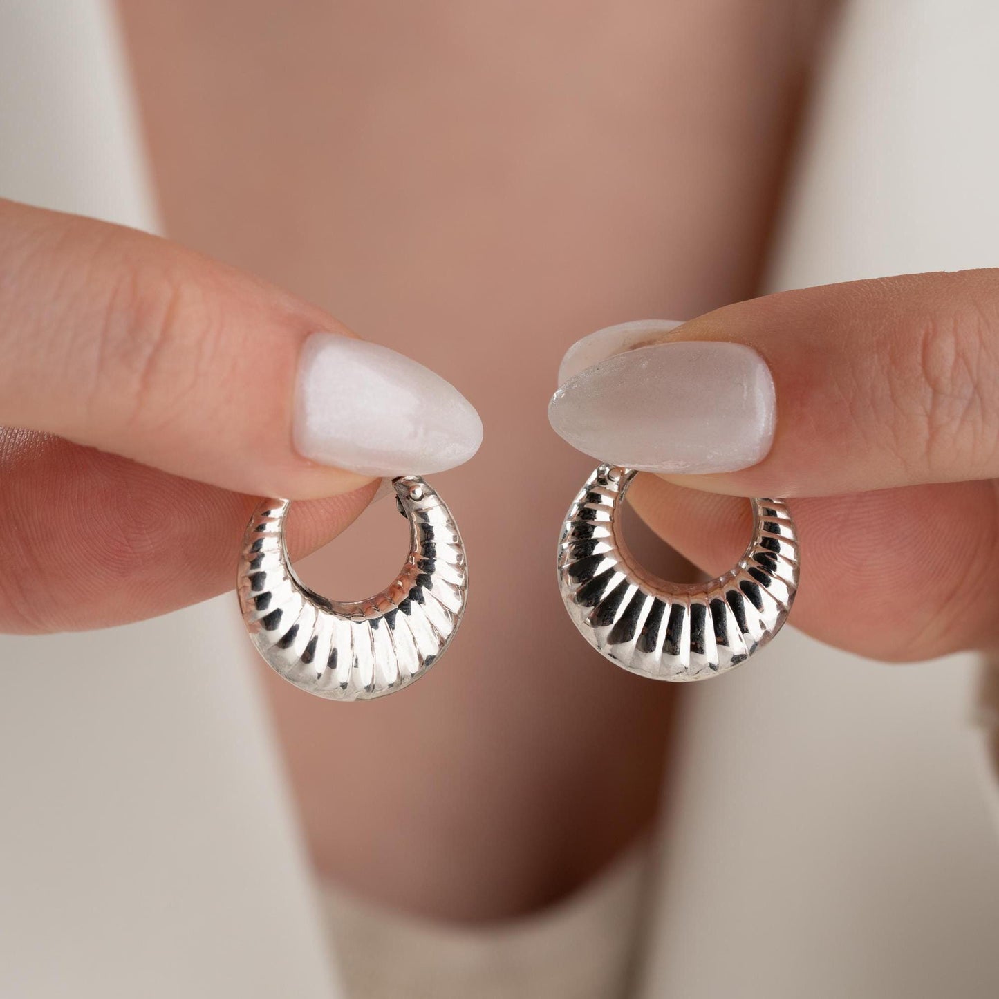 Crescent-shaped hoop earrings crafted from 925 sterling silver with 14K gold-plated options, featuring a textured design, perfect for Christmas gifts.