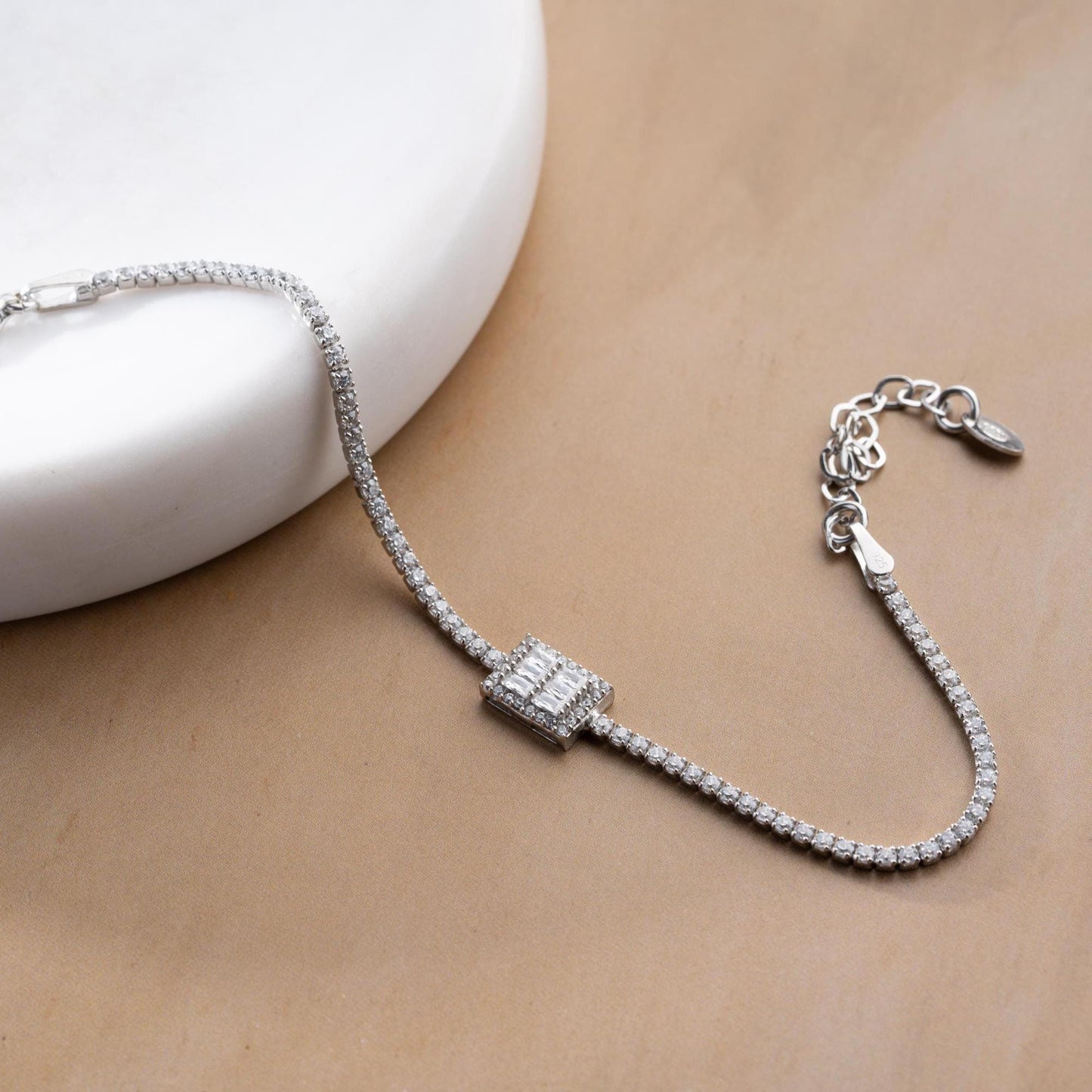 Elegant baget bracelet with cubic zirconia stones, made of 925 sterling silver, available in silver and gold finishes.