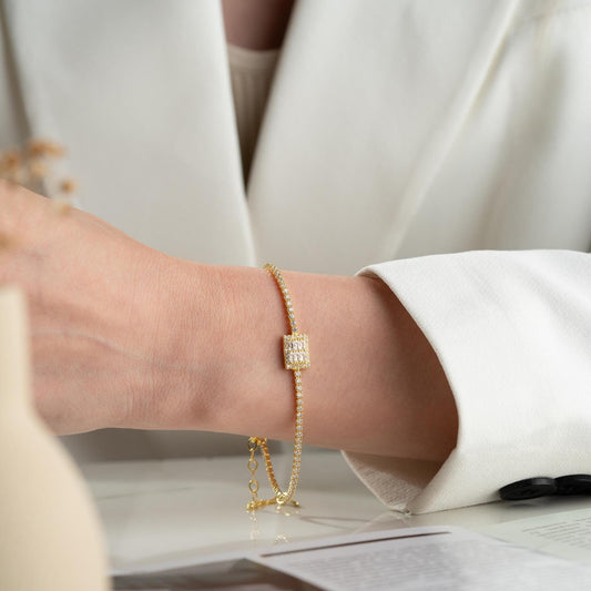 Elegant baget bracelet with cubic zirconia stones, made of 925 sterling silver, available in silver and gold finishes.