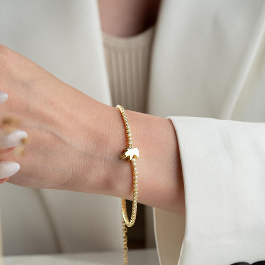 Angel Charm Bracelet in 925 Sterling Silver with a 14K Gold Plated angel charm and cubic zirconia stones, elegantly displayed.