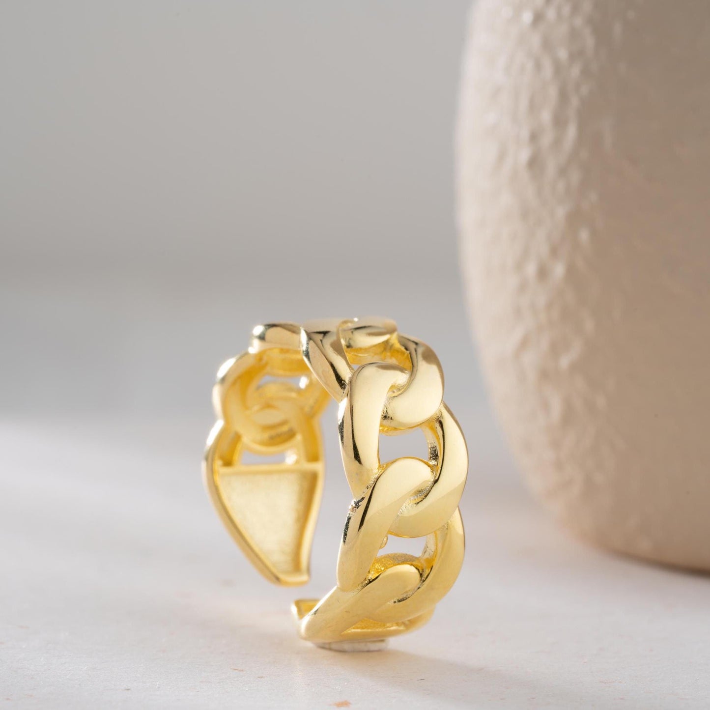 Chunky chain link open ring crafted from 925 sterling silver, available in gold plated and silver finishes. Adjustable design for a perfect fit.