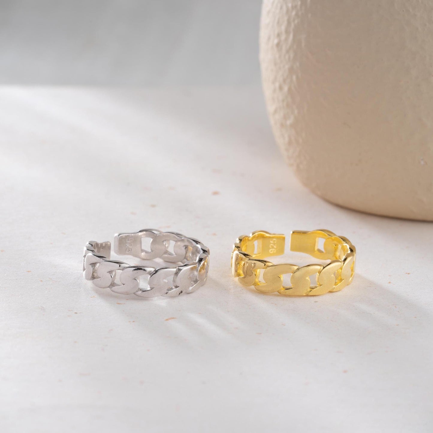Chunky chain link ring crafted from 925 sterling silver with 14K gold plating, featuring an adjustable open band. Stylish unisex jewelry perfect for bold statement looks.