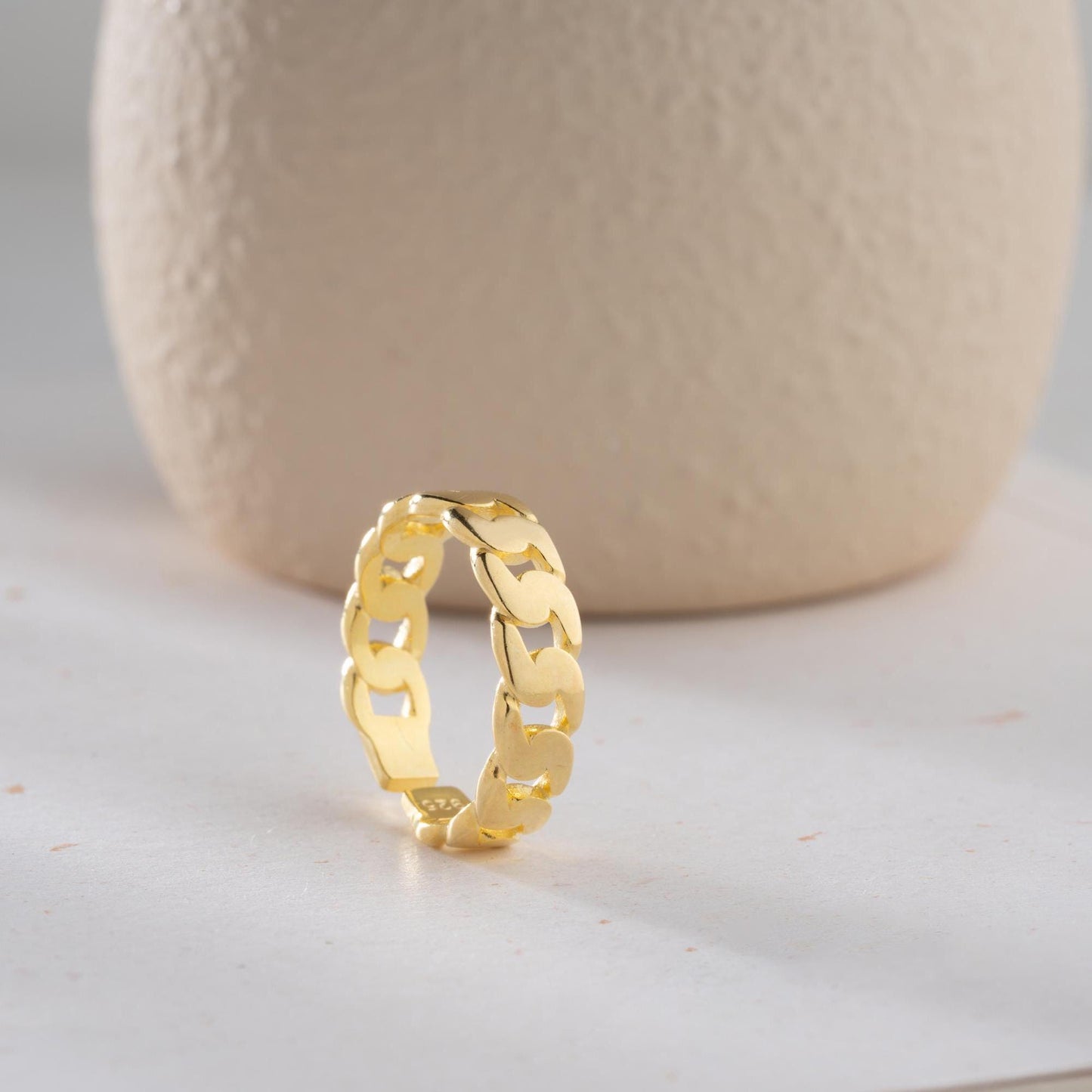 Chunky chain link ring crafted from 925 sterling silver with 14K gold plating, featuring an adjustable open band. Stylish unisex jewelry perfect for bold statement looks.