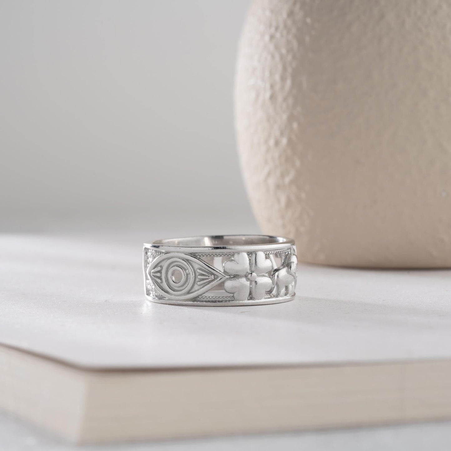 Floral wide band ring with intricate openwork flower design, available in 925 sterling silver and 14K gold plating. Elegant nature-inspired jewelry perfect for gifting.