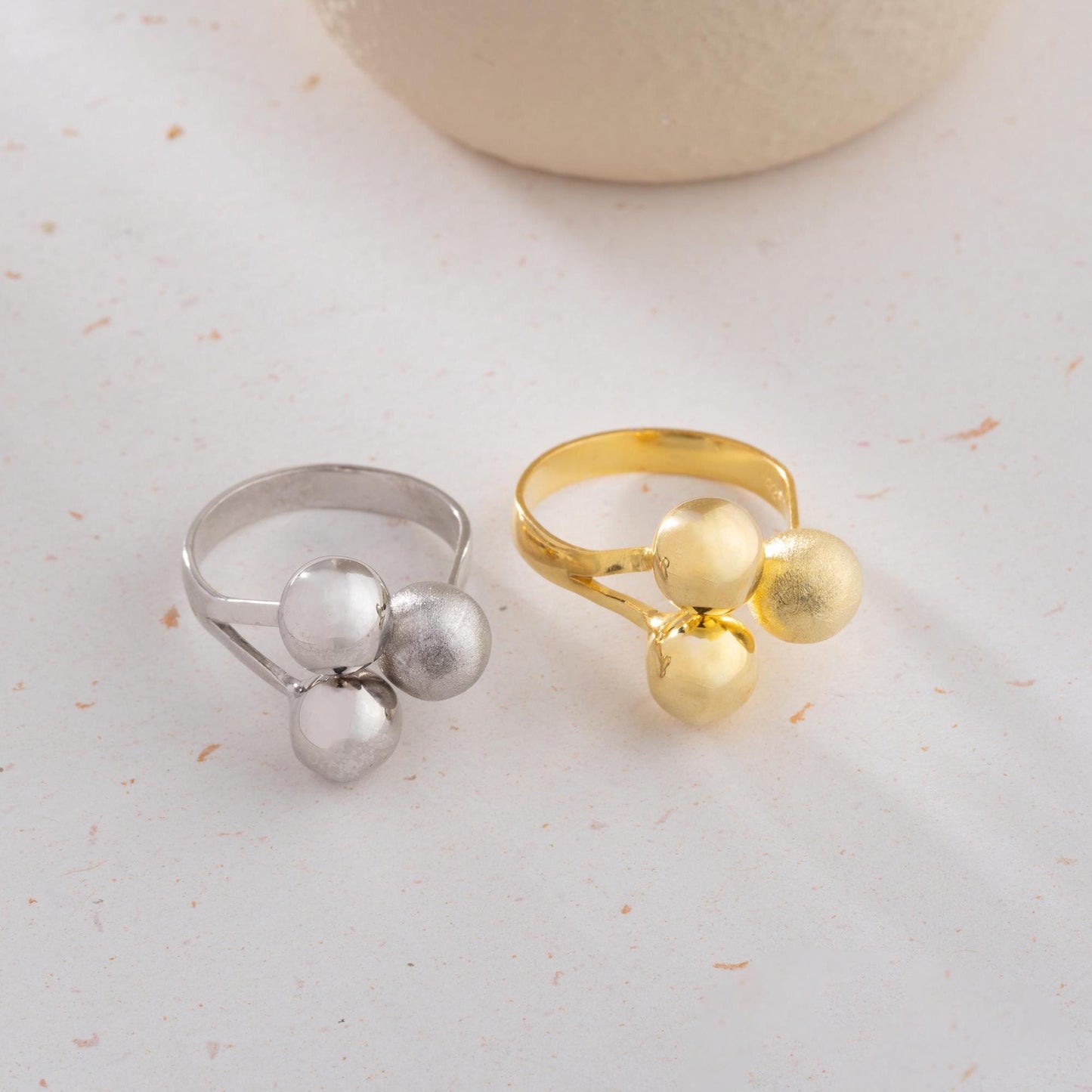 Triple ball adjustable open ring in 925 sterling silver and 14K gold plating, featuring a mix of shiny, matte, and brushed textures.