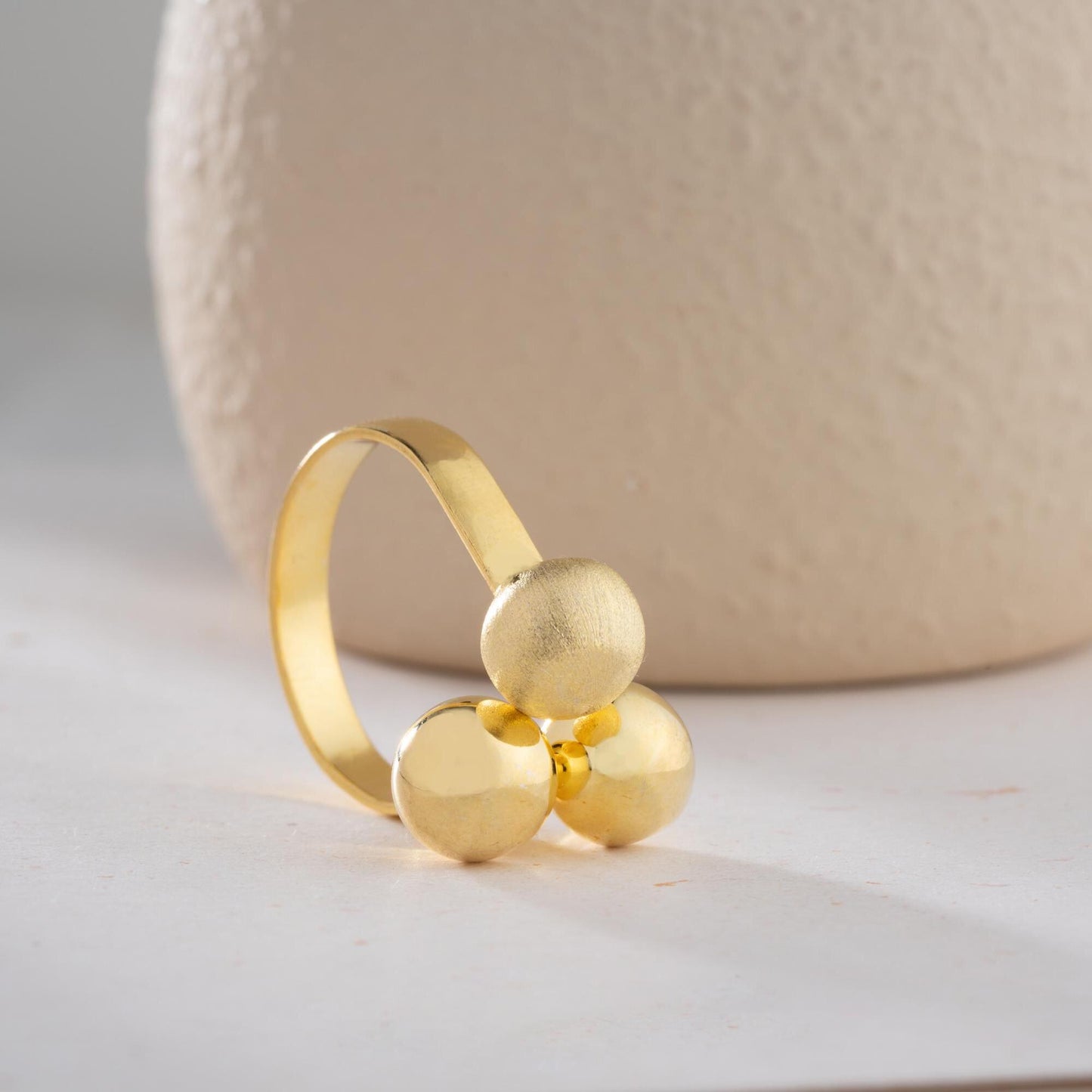 Triple ball adjustable open ring in 925 sterling silver and 14K gold plating, featuring a mix of shiny, matte, and brushed textures.