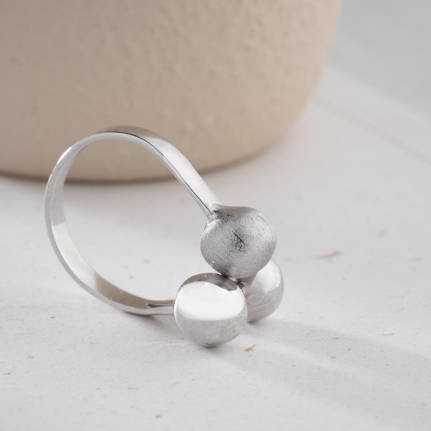 Triple ball adjustable open ring in 925 sterling silver and 14K gold plating, featuring a mix of shiny, matte, and brushed textures.