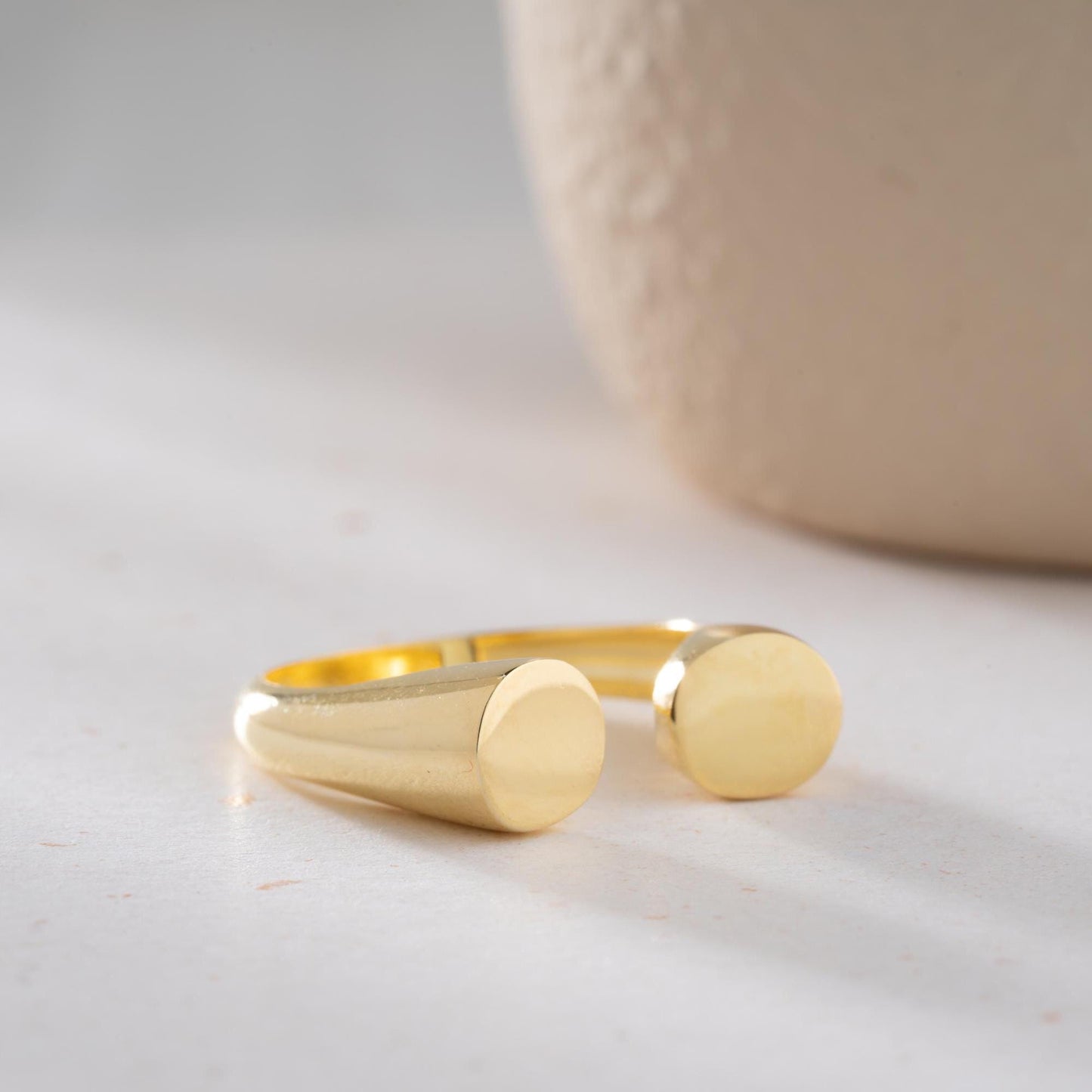 Minimalist open-band ring crafted from 925 Sterling Silver, available with a 14K Gold Plated option. A sleek and bold adjustable ring, ideal for gifting and daily wear.