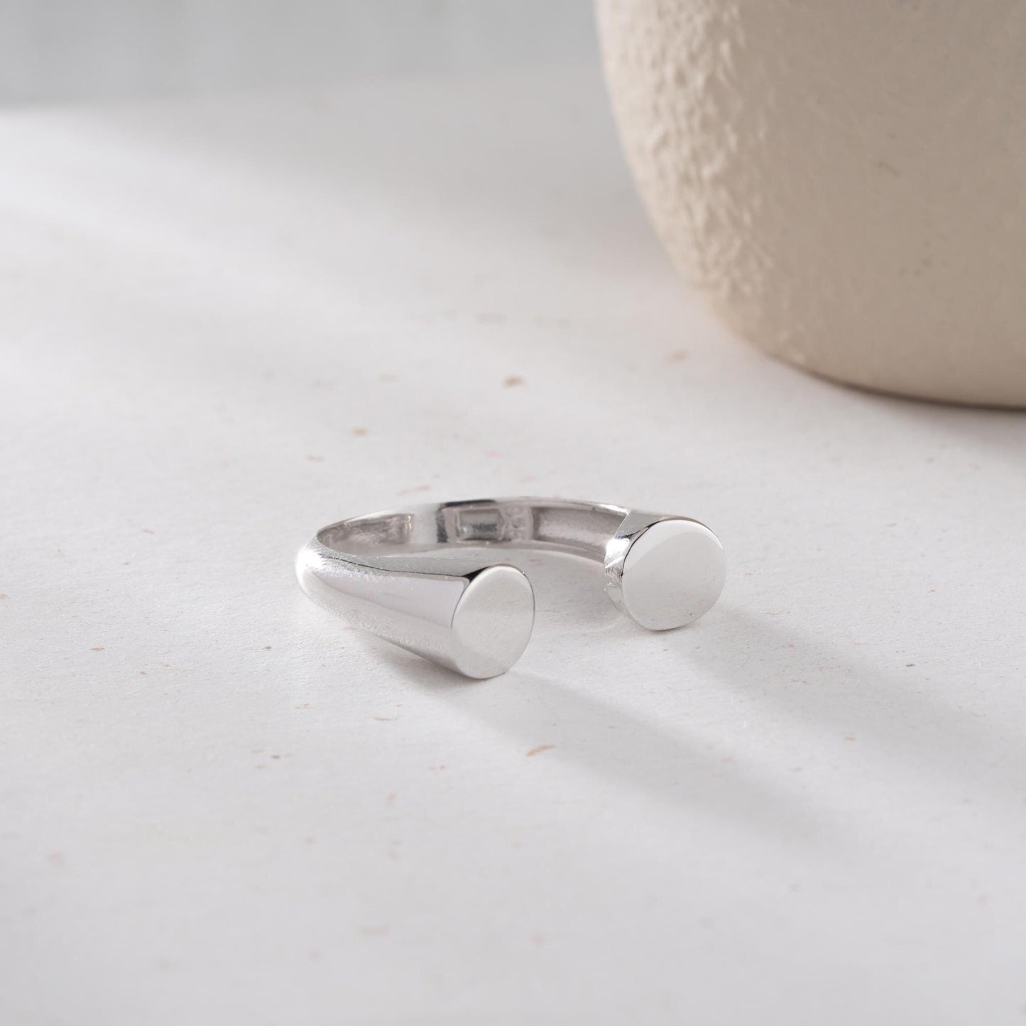 Minimalist open-band ring crafted from 925 Sterling Silver, available with a 14K Gold Plated option. A sleek and bold adjustable ring, ideal for gifting and daily wear.