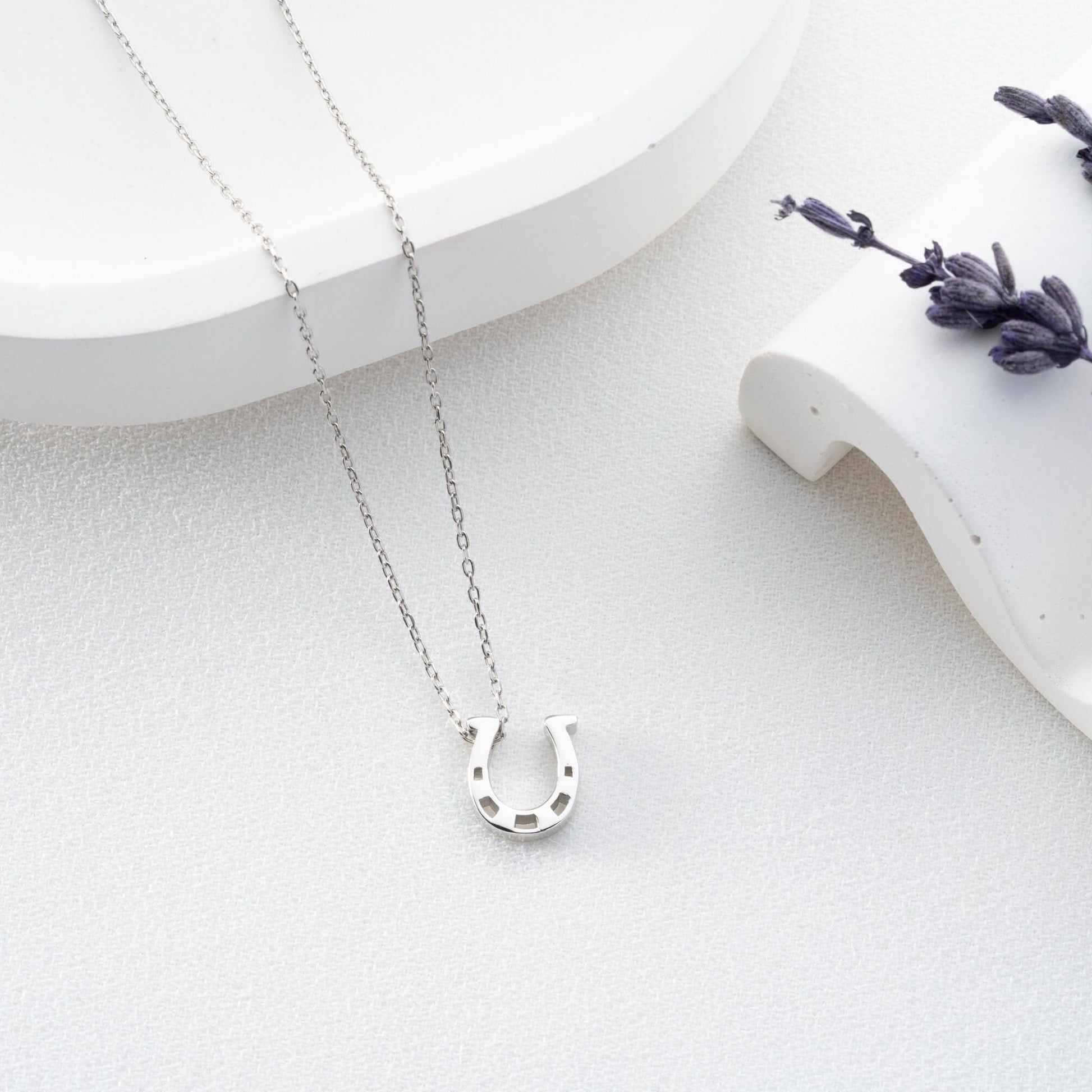925 Sterling Silver Necklace adorned with zircon stones and featuring a horseshoe symbol, available in multiple colors and lengths.