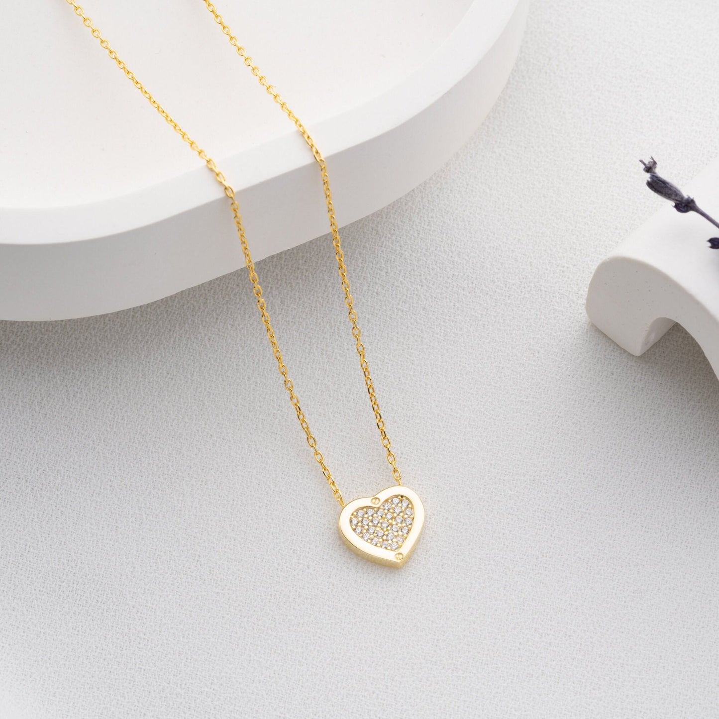 Elegant heart-shaped necklace crafted from 925 sterling silver, adorned with a central zircon stone, presented in a gift box