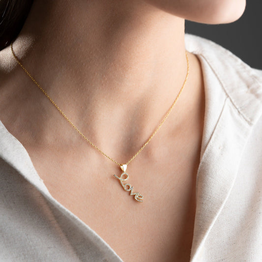 Handmade sterling silver; necklace with shimmering zircon stones delicately set along the word, reflecting elegance and romance