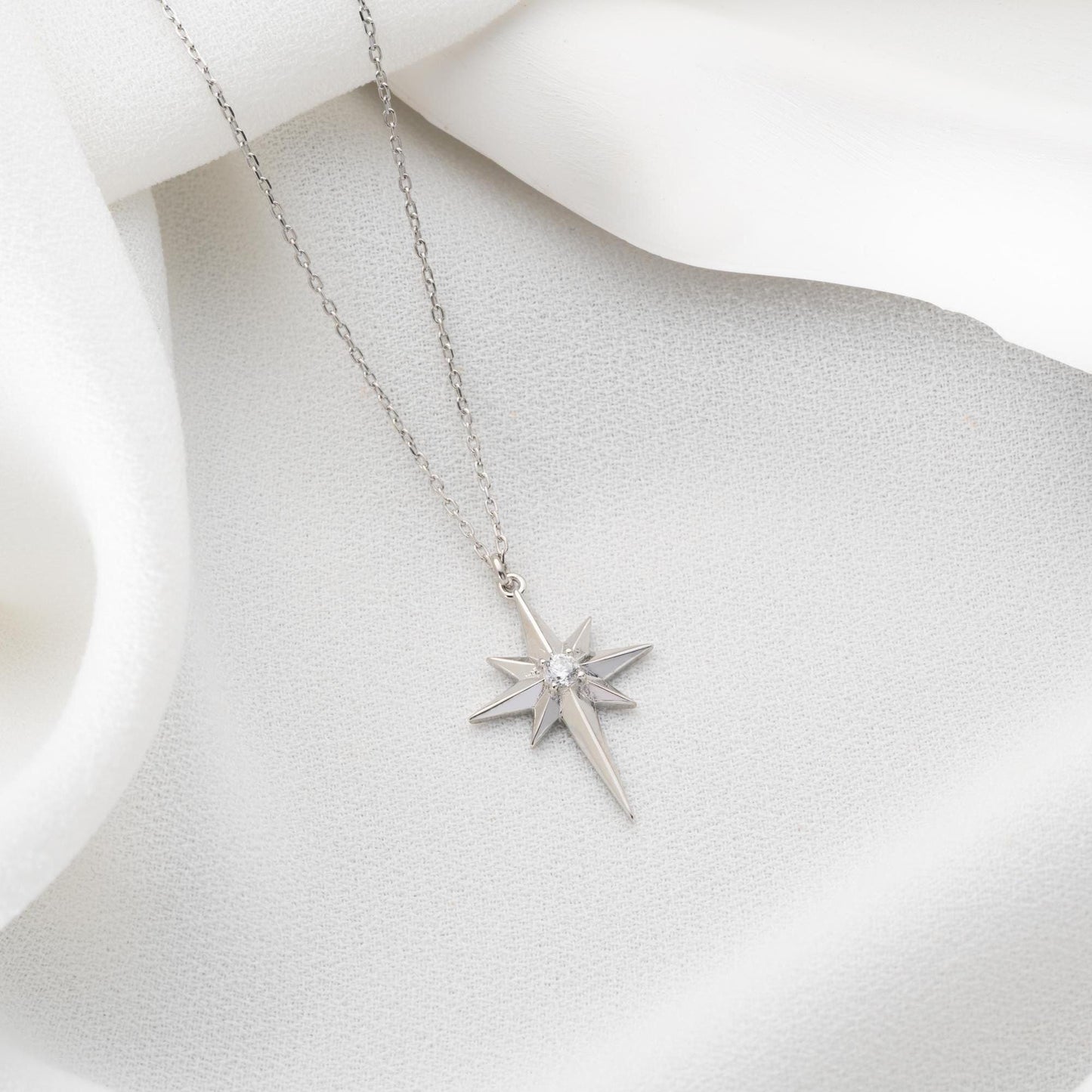 Silver North Star Necklace with Zircon Stone Embellishments