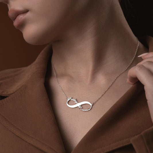 Custom infinity necklace with two personalized names, crafted in 925 sterling silver and 14k gold plated options. A timeless symbol of eternal love and unity.