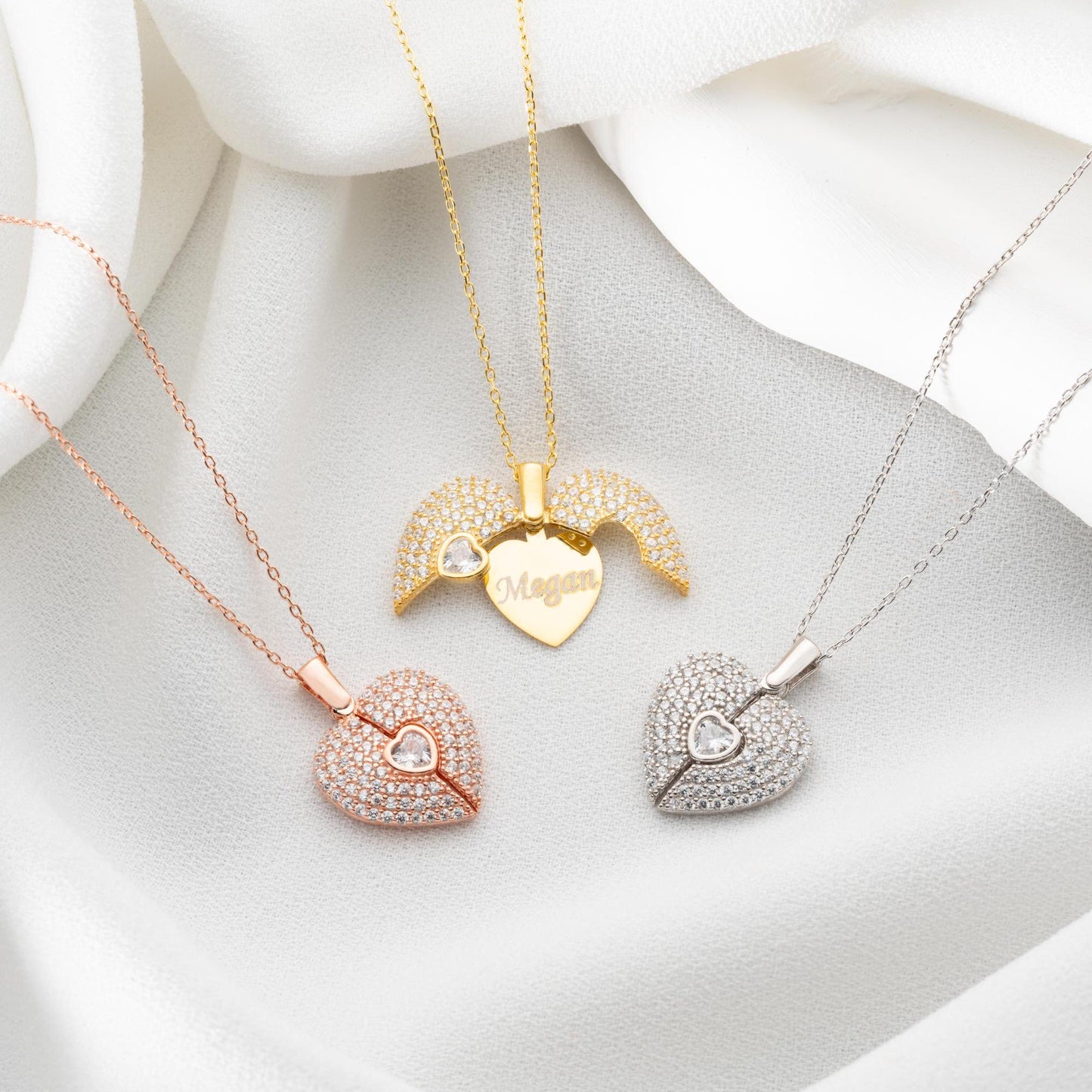 Personalized heart necklace with angel wings and name engraving, available in 925 sterling silver, 14k gold, and rose gold plated options. A meaningful, handmade jewelry gift for loved ones.