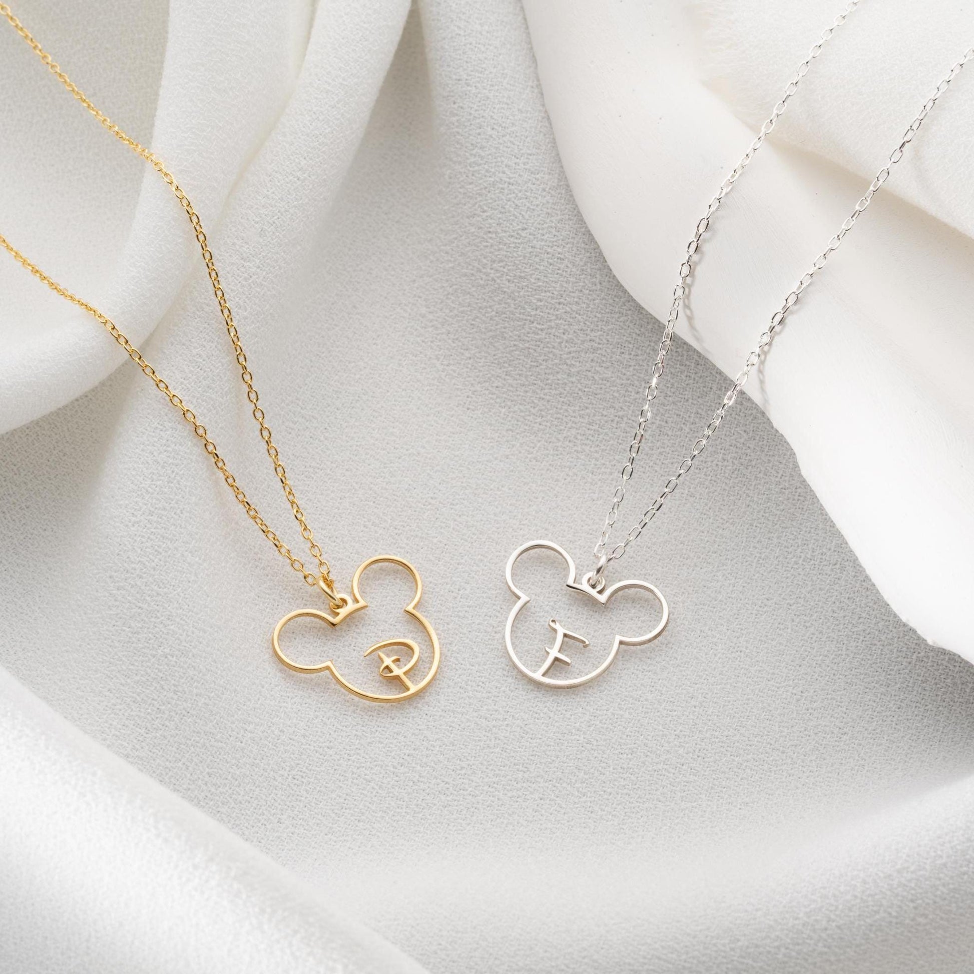 Custom initial necklace with a unique letter-in-pendant design, crafted in 925 sterling silver or 14k gold plated. A personalized and elegant handmade jewelry gift.