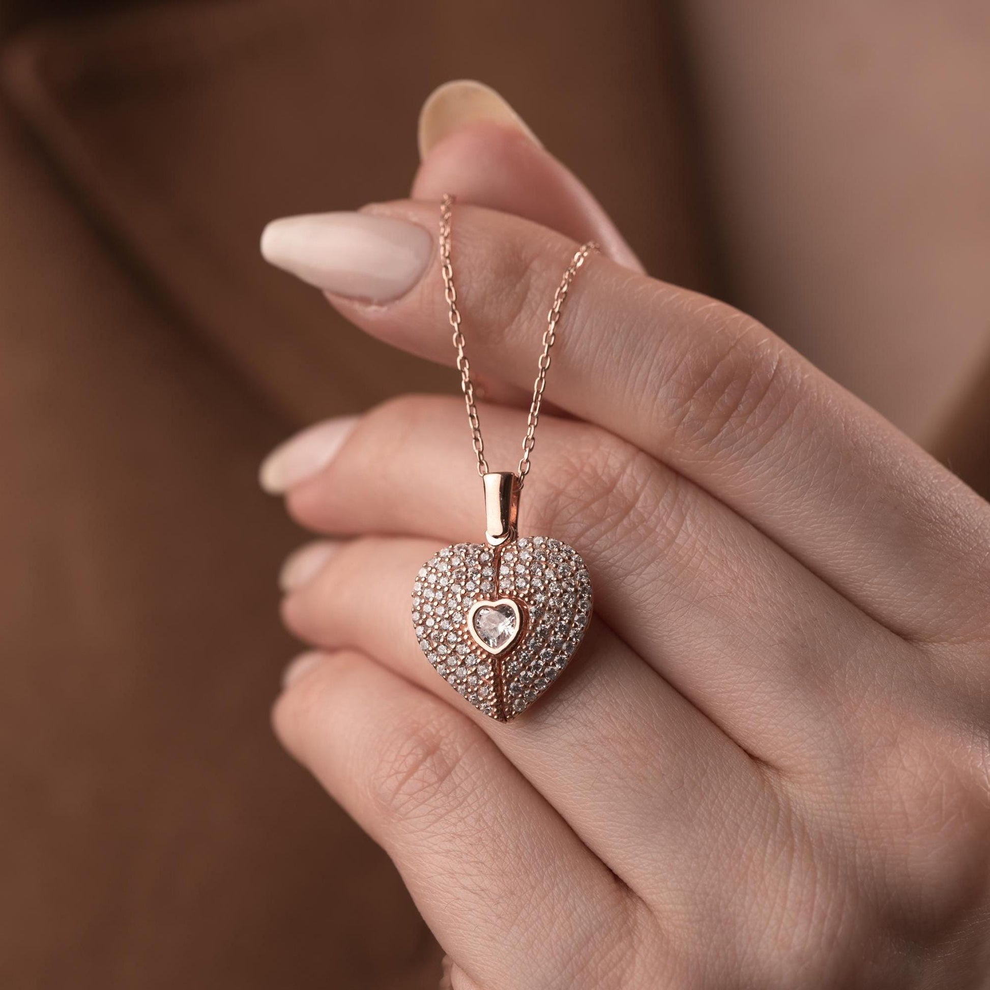 Personalized heart necklace with angel wings and name engraving, available in 925 sterling silver, 14k gold, and rose gold plated options. A meaningful, handmade jewelry gift for loved ones.
