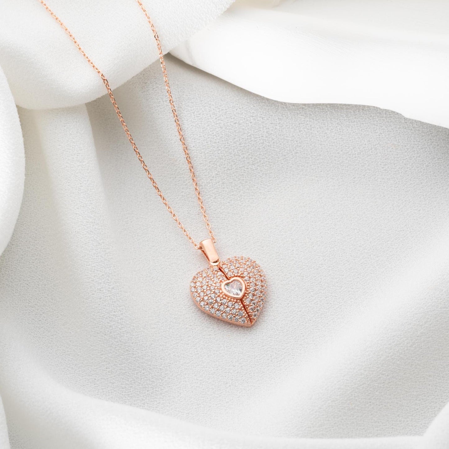 Personalized heart necklace with angel wings and name engraving, available in 925 sterling silver, 14k gold, and rose gold plated options. A meaningful, handmade jewelry gift for loved ones.