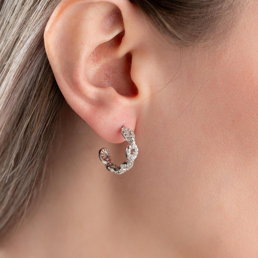 Chain link hoop earrings in 925 sterling silver with 14K gold plated option, adorned with sparkling cubic zirconia stones, ideal for gifting.