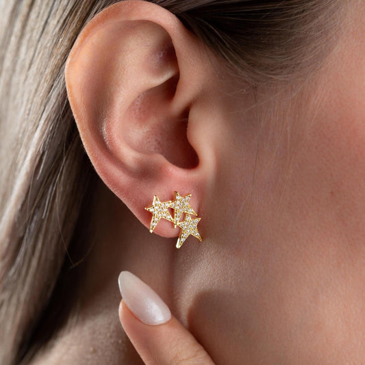 Star cluster earrings in 925 Sterling Silver and 14K Gold Plated options, adorned with cubic zirconia stones for an elegant holiday look.