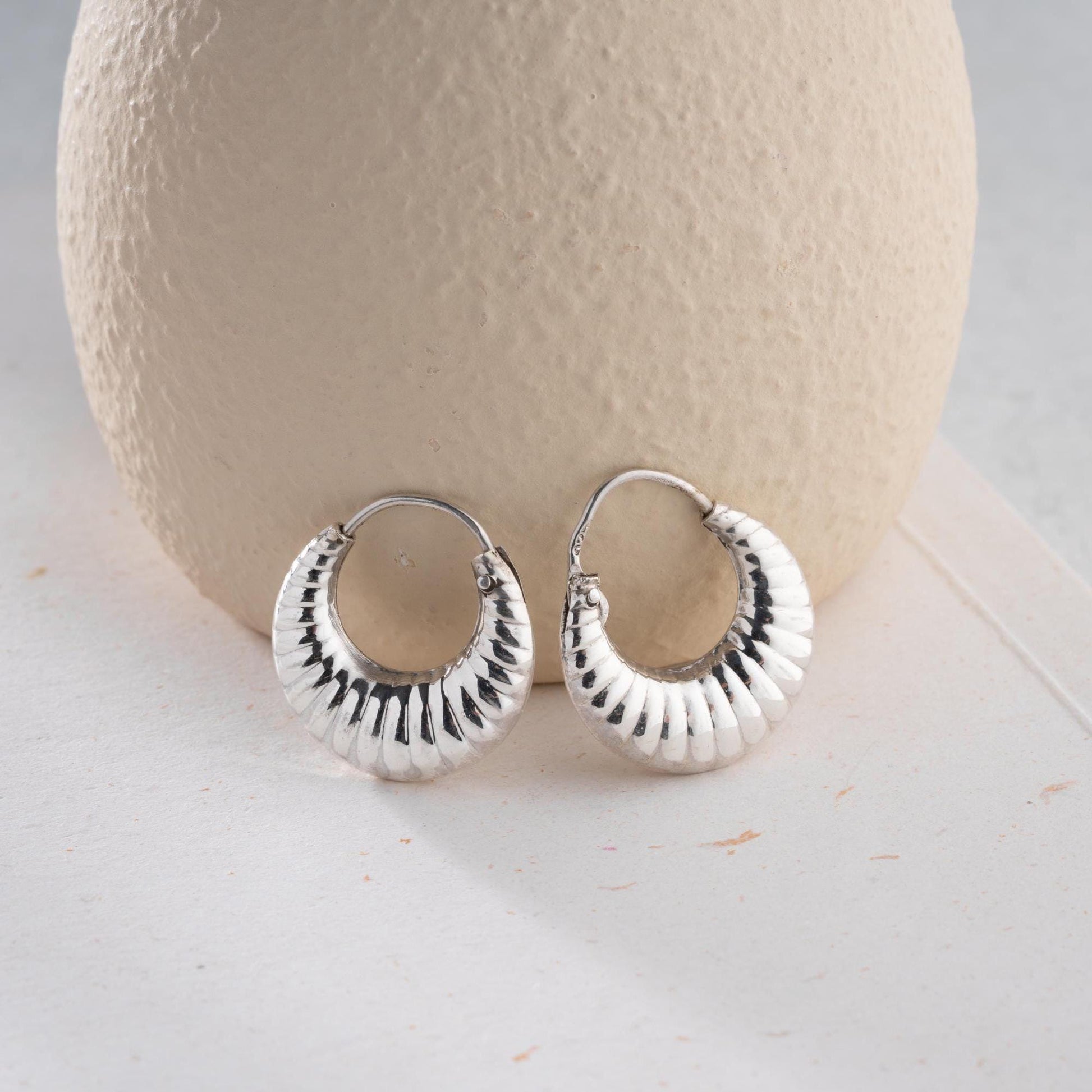 Crescent-shaped hoop earrings crafted from 925 sterling silver with 14K gold-plated options, featuring a textured design, perfect for Christmas gifts.