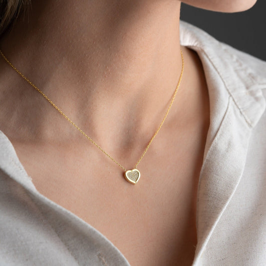 Elegant heart-shaped necklace crafted from 925 sterling silver, adorned with a central zircon stone, presented in a gift box