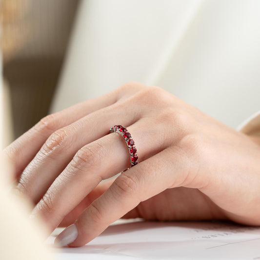 Single vibrant tennis ring crafted in 925 Sterling Silver with colorful cubic zirconia stones, available in rainbow, red, blue, green, black, and pink.