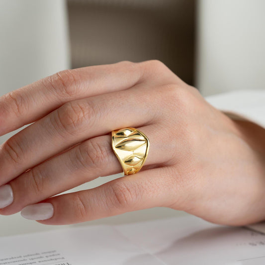 Chunky geometric signet ring with bold diamond-shaped design, crafted from 925 sterling silver and available in 14K gold plating. A modern and adjustable statement piece for men and women.