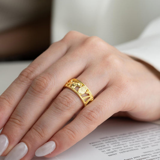 Floral wide band ring with intricate openwork flower design, available in 925 sterling silver and 14K gold plating. Elegant nature-inspired jewelry perfect for gifting.